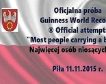 Ilustracja do artykułu: Oficjalna próba Guinness World Records ® Official attempt: „Most people carrying a banner'
